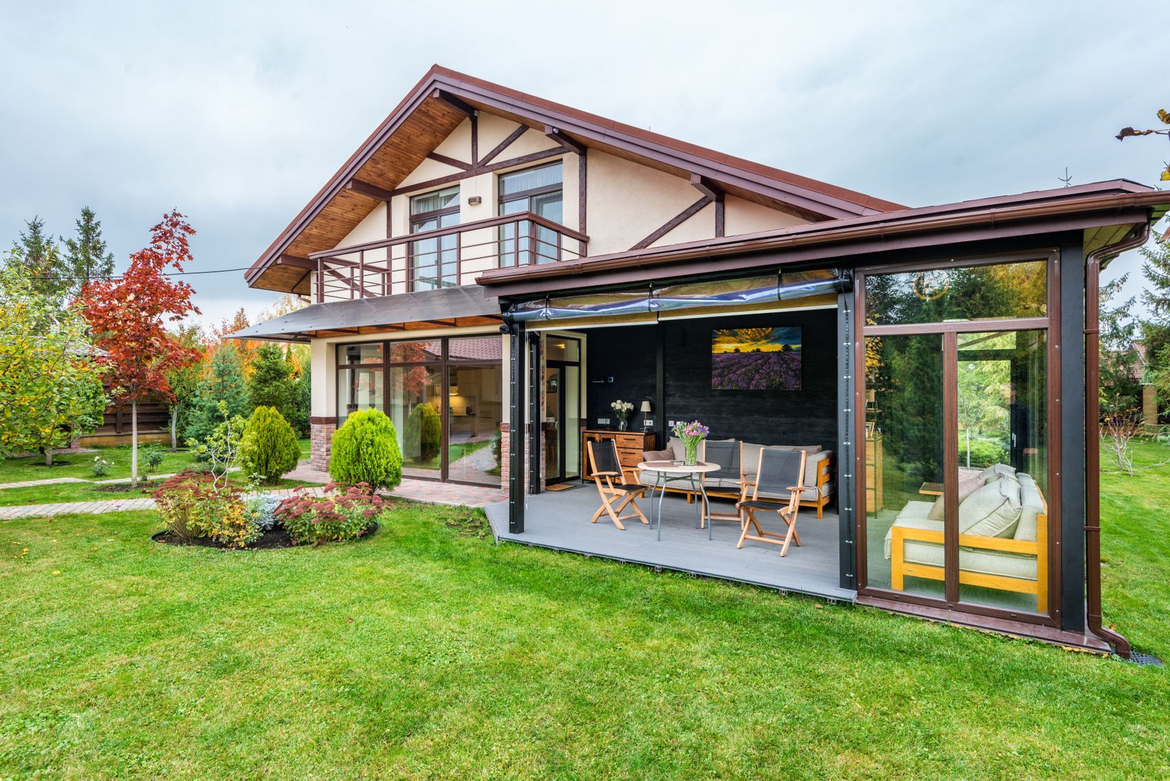 A glazed garden room extension on the back of a house