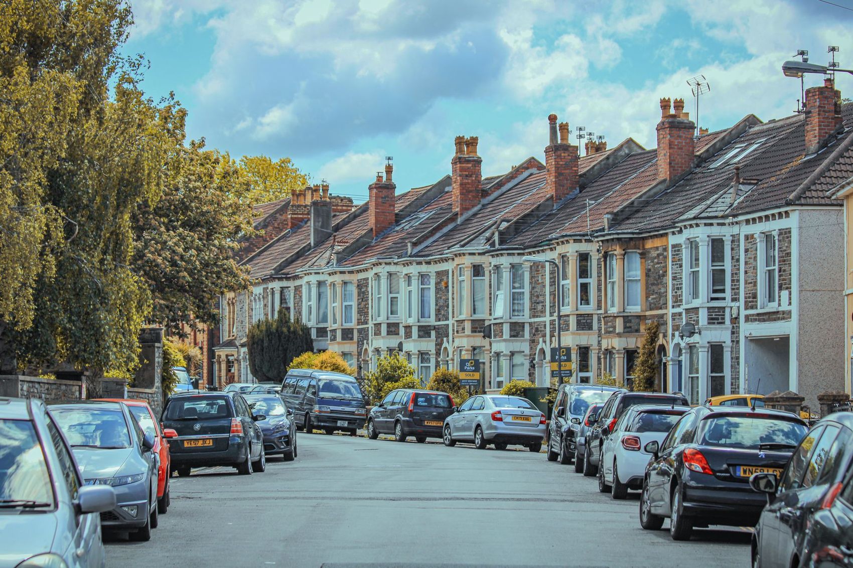 A street of bay-fronted terraced houses