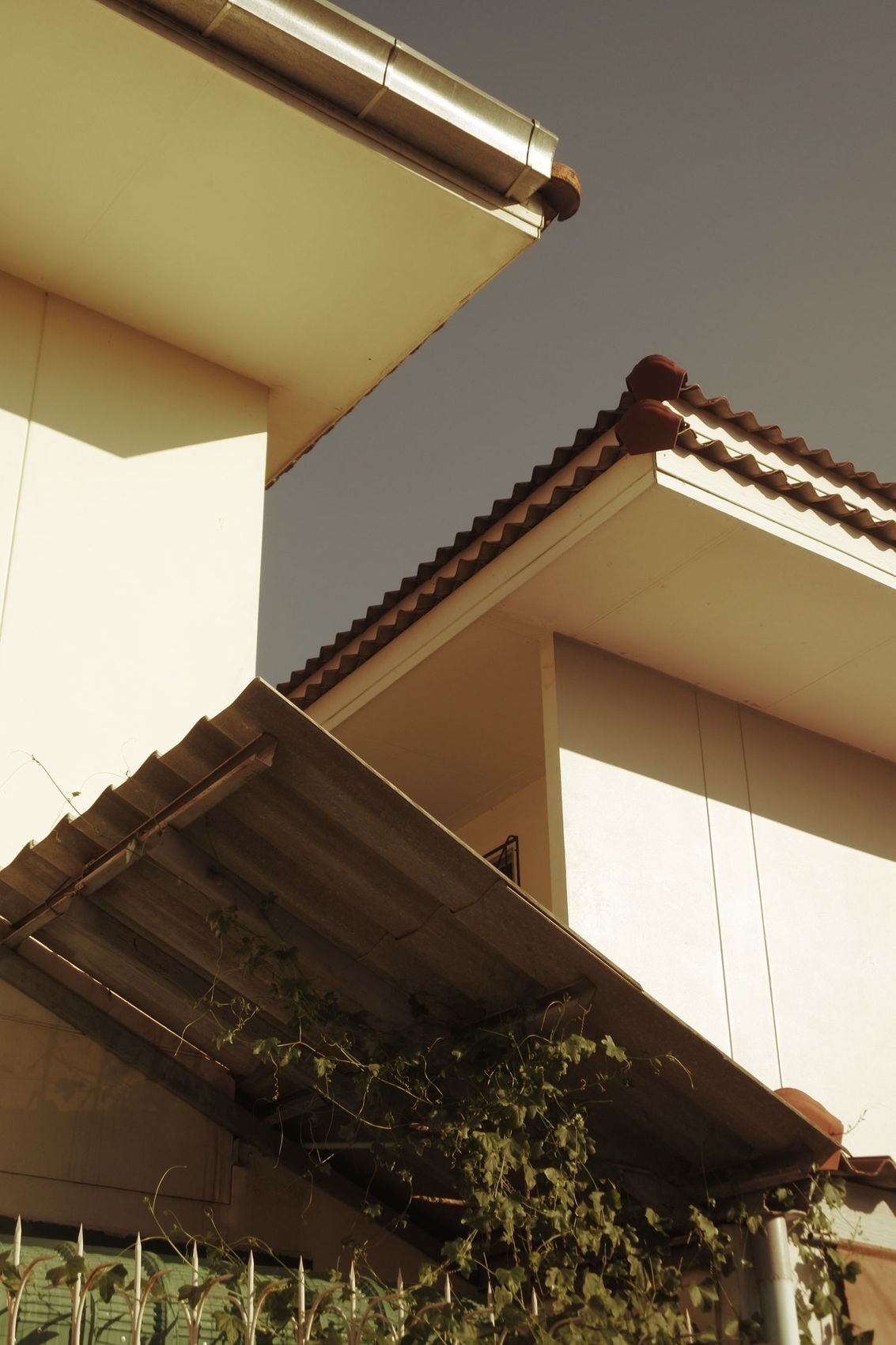 Close view of guttering and a soffit at the eaves of a house